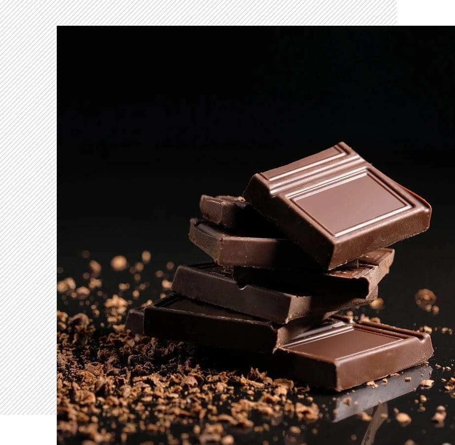 Stack of dark chocolate pieces.